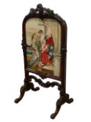Victorian heavily carved rosewood firescreen with tapestry panel, H118cm,
