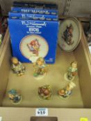 Six Hummel figures and Hummel Annual Plates in one box