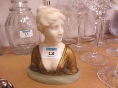 Art Deco period Schumacher carved alabaster and bronze bust of a young woman on a green onyx base,