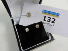 Pair of diamond stud ear-rings stamped 750