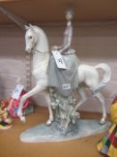 Lladro figure of a lady riding a white horse H44.