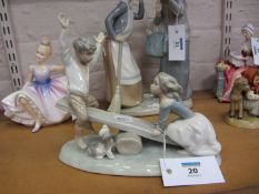 Lladro figure group of children on a see-saw H20cm Condition Report No chips, cracks or restorations