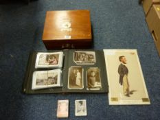 Postcards including Scarborough, photograph album, photographs, Vanity Fair print, James Bond cards,