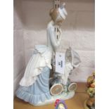 Lladro figure of a woman pushing a pram H33cm  Condition Report No chips, cracks or restorations