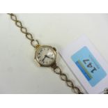 Swiss made gold watch hallmarked 9ct on bracelet stamped 9ct