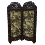 19th century Eastern carved walnut folding screen with two panel set with hunting scenes, H200cm,