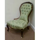 Victorian walnut nursing chair with carved details upholstered in turquoise cover