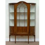 Edwardian inlaid mahogany bow front display cabinet enclosed by single astragal glazed door with