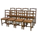 Set eight Yorkshire adzed oak 'Acornman'  chairs, upholstered in studded tan leather,