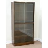 Mid 20th century oak two tier library bookcase with sliding glass doors, H104cm,