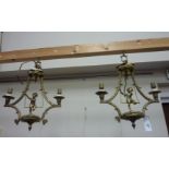 Pair of two branch light fittings modelled as cherubs on swings H43cm