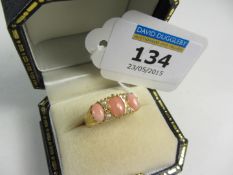 Gold-plated coral three stone ring