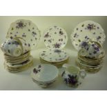 Hammersley & Co. tea service decorated with violets  Condition Report 8 cups
12 saucers
12 side