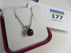 Burmese ruby pendant (approx 1 carat) stamped 750 on white gold chain hallmarked 9ct