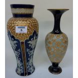 Two early 20th century Doulton stoneware vases H28.