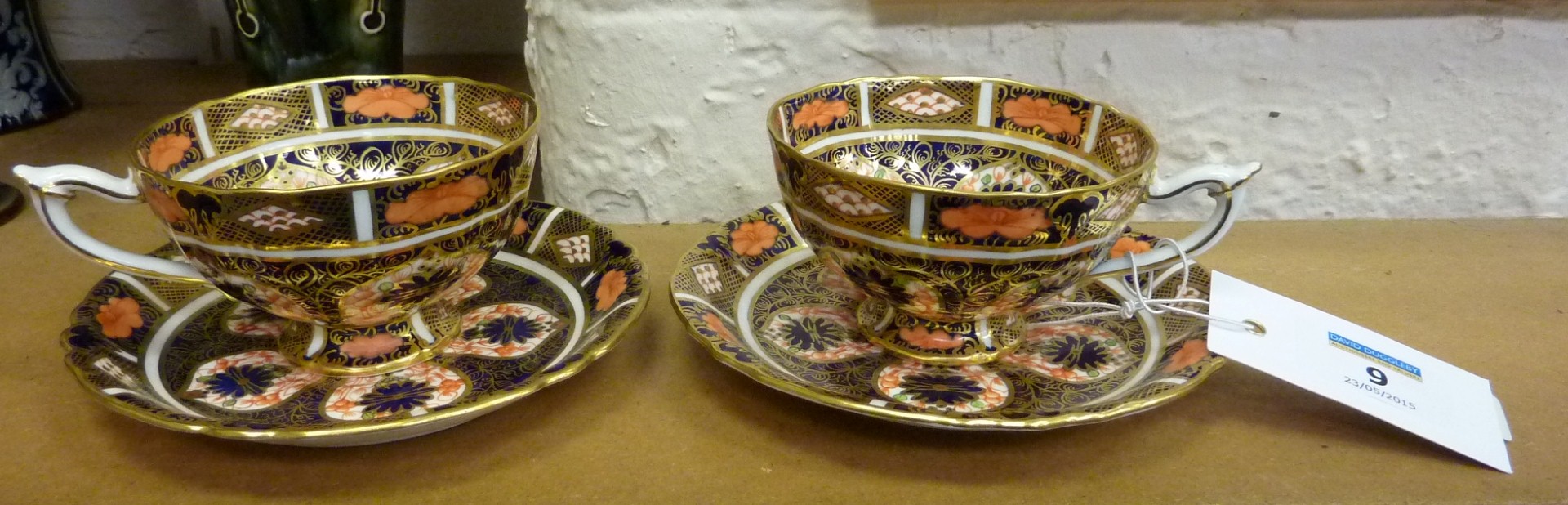 Two Royal Crown Derby cups and saucers - 1128 pattern