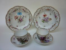 Pair of 19th Century Meissen shallow dishes painted with floral sprays and a similar pair of tea