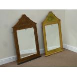 Two shaped top painted wall mirrors with bevelled glass,