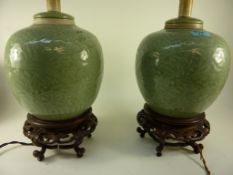 Pair Chinese Celadon green porcelain ginger jar lamps 23cm on hardwood stands