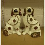 Pair Staffordshire spaniels with copper lustre  H10.9cm  Condition Report good condition
