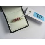 Gold ring set with four rubies and six diamonds hallmarked 9ct