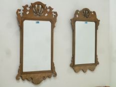 Reproduction walnut Chippendale style fret work mirror, with feathers motif (49cm x 85cm),