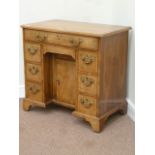 Early 20th century George II style walnut kneehole desk,