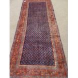 Persian Arrak red and blue ground runner rug,