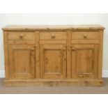 Traditional pine dresser base fitted with three drawers and three cupboards