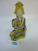 19th century Chinese polychrome enamelled figure of an Immortal on bended knee 23cm Condition Report