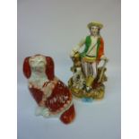 Victorian Staffordshire flatback figure of a sportsman with dog H28cm and a Staffordshire spaniel