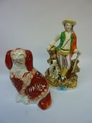 Victorian Staffordshire flatback figure of a sportsman with dog H28cm and a Staffordshire spaniel