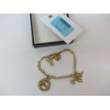 Gold charm bracelet hallmarked 9ct