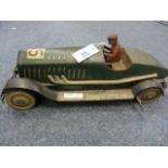 Clockwork tin plate racing car with driver, the wheels marked Dunlop J.D. Cord L50cm approxCondition