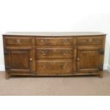 18th century Yorkshire oak dresser fitted with five drawers and two fielded panel cupboards, W185cm,