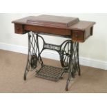 Early 20th century Singer treadle sewing machine, oak case on cast iron base,