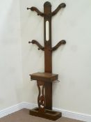 Early 20th century mahogany coat stand fitted with mirror and compartment,