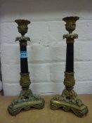 Pair of 19th century ebony and gilt metal candlesticks H29cm