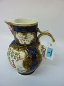 First Period Worcester porcelain jug, scale blue cabbage leaf moulded body with mask-head spout,