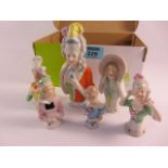 Collection of pincushion dolls including one large, three with open arms,