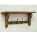 Rustic pine four hoot coat rack,