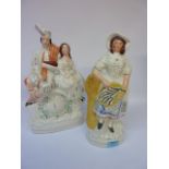 Two Victorian Staffordshire flatback figures - fishwife H33cm and Highland couple on clock H14cm