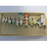 Collection of pin cushion dolls in one box