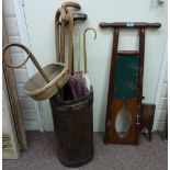 Stick/umbrella stand and contents,