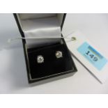 Pair of diamond stud ear-rings stamped 750 approx 1 carat