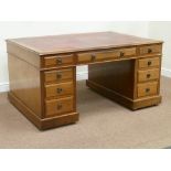 Edwardian mahogany partners desk fitted with nine drawers to either side and inset red tooled