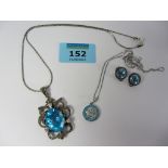 Two pendant necklaces set with blue stones stamped 925 and a similar pair of ear-rings stamped