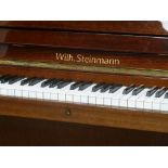 Steinmann Germany upright piano in lacquered mahogany case, iron framed, (W144cm),