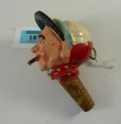 Novelty wine cork in the form of a jockey, with wind up musical movement H13.