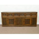 18th century oak dresser base fitted with two cupboards and three drawers with later Victorian